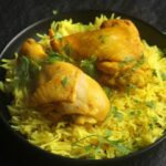 a picture of the turmeric chicken on the rice