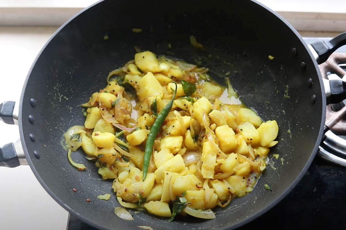 Aloo Bhaji in a pan with water added