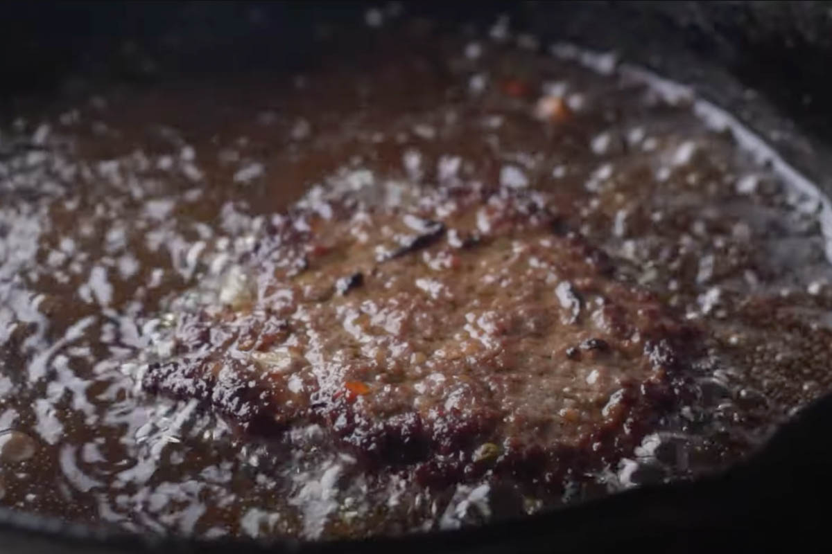 Chapli Kabab frying in a pan