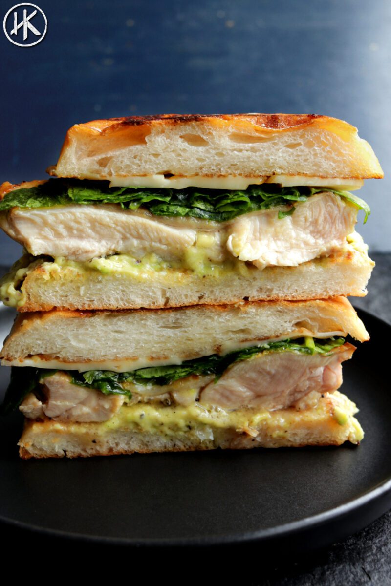 Chicken and avocado sandwich on a plate