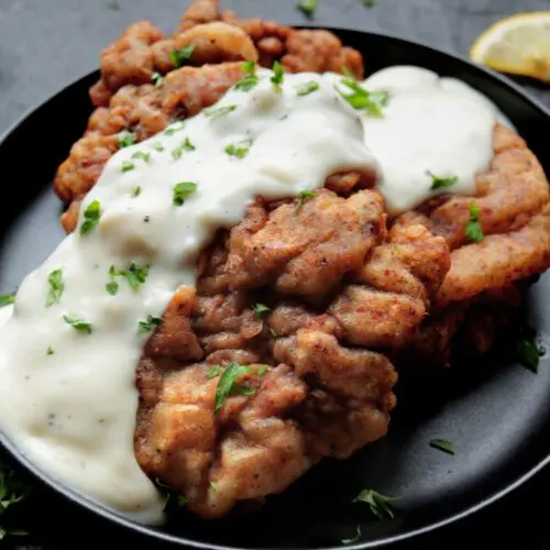 Chicken Fried Steak on a plate with gravy