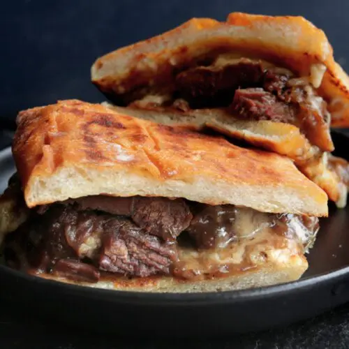 Osso bucco sandwich cut in half