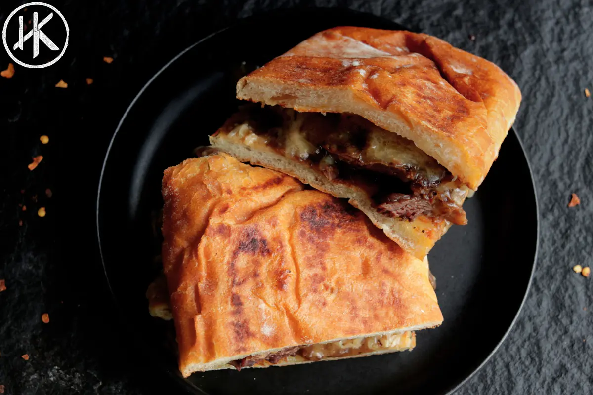 Osso bucco sandwich on a kitchen counter