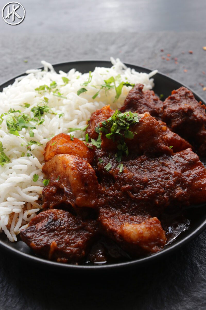 Pork vindaloo with rice