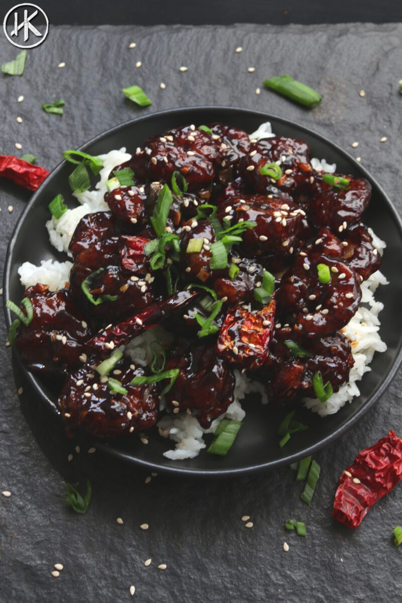 General Tso shrimp on a plate with rice.