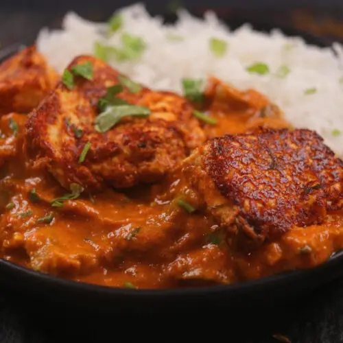 Paneer Tikka Masala in a bowl with rice.